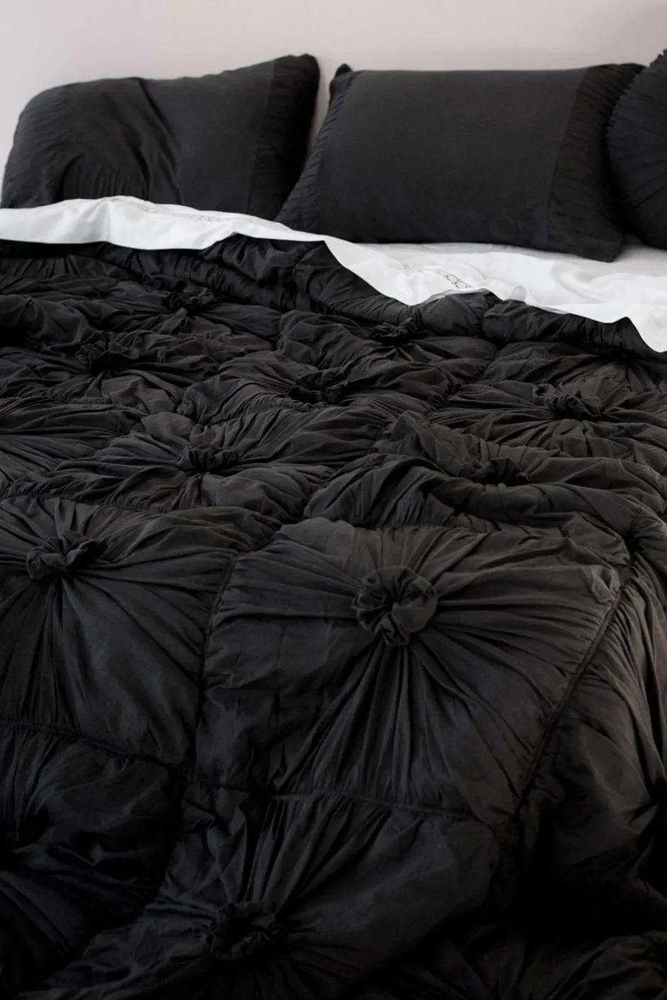 rosette_quilt_in_charcoal_organic_cotton_3.webp Store Lazybones Rosette Quilt In Charcoal *Organic Cotton