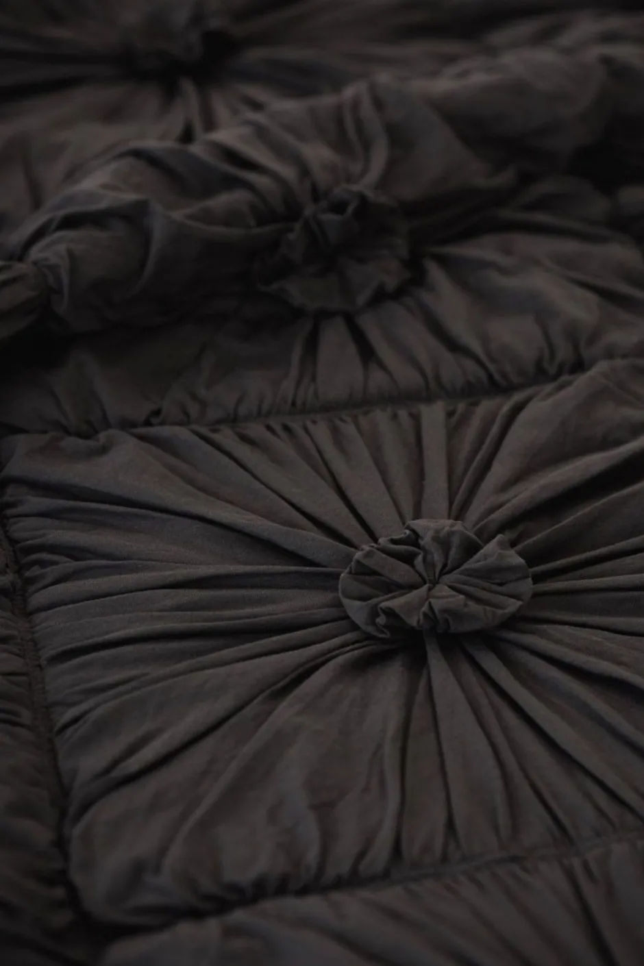 rosette_quilt_in_charcoal_organic_cotton_4.webp Store Lazybones Rosette Quilt In Charcoal *Organic Cotton